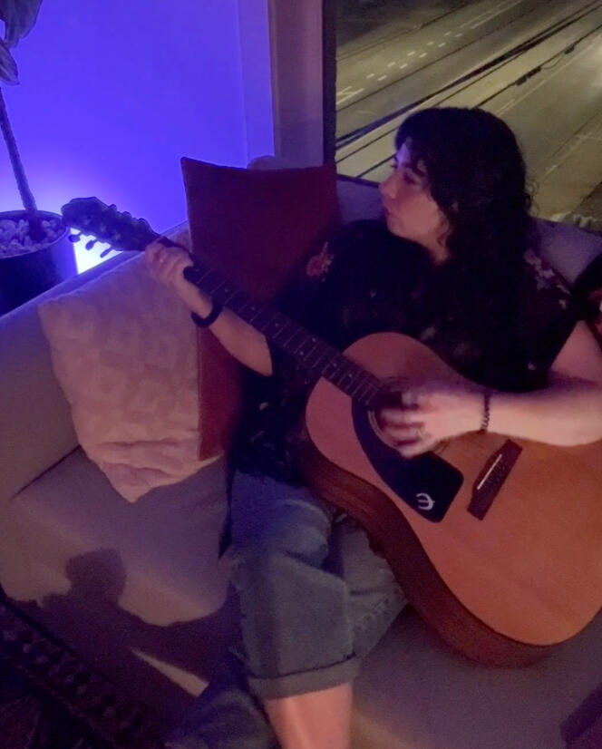 Amelia Tritico Playing Guitar